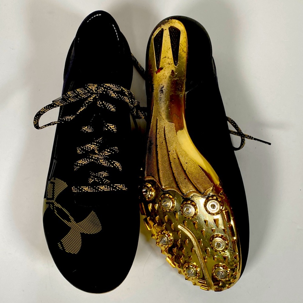 Mens Under Armour black and gold shoes